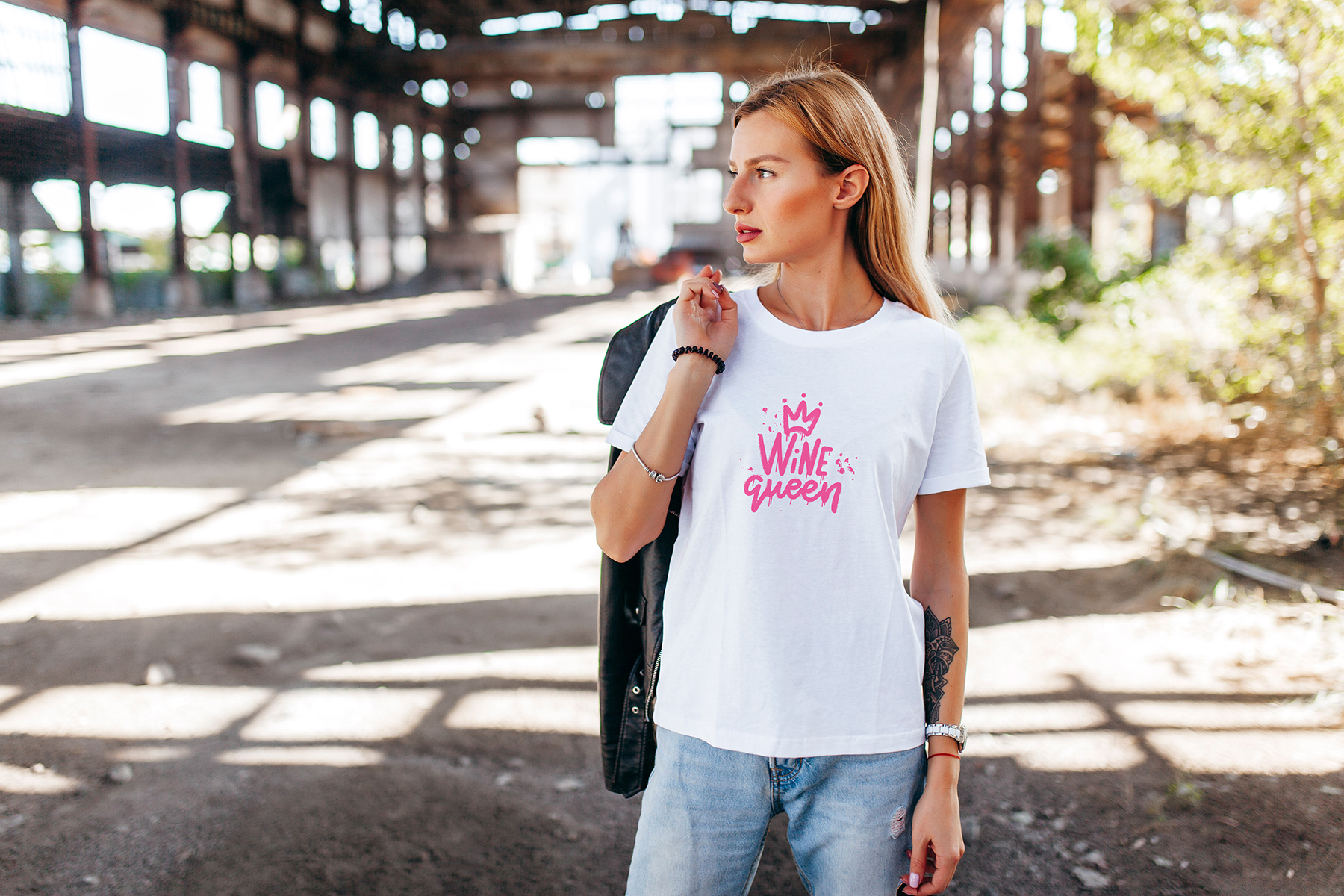 Campaign photograph in an industrial space — Wine Queen graphic tee