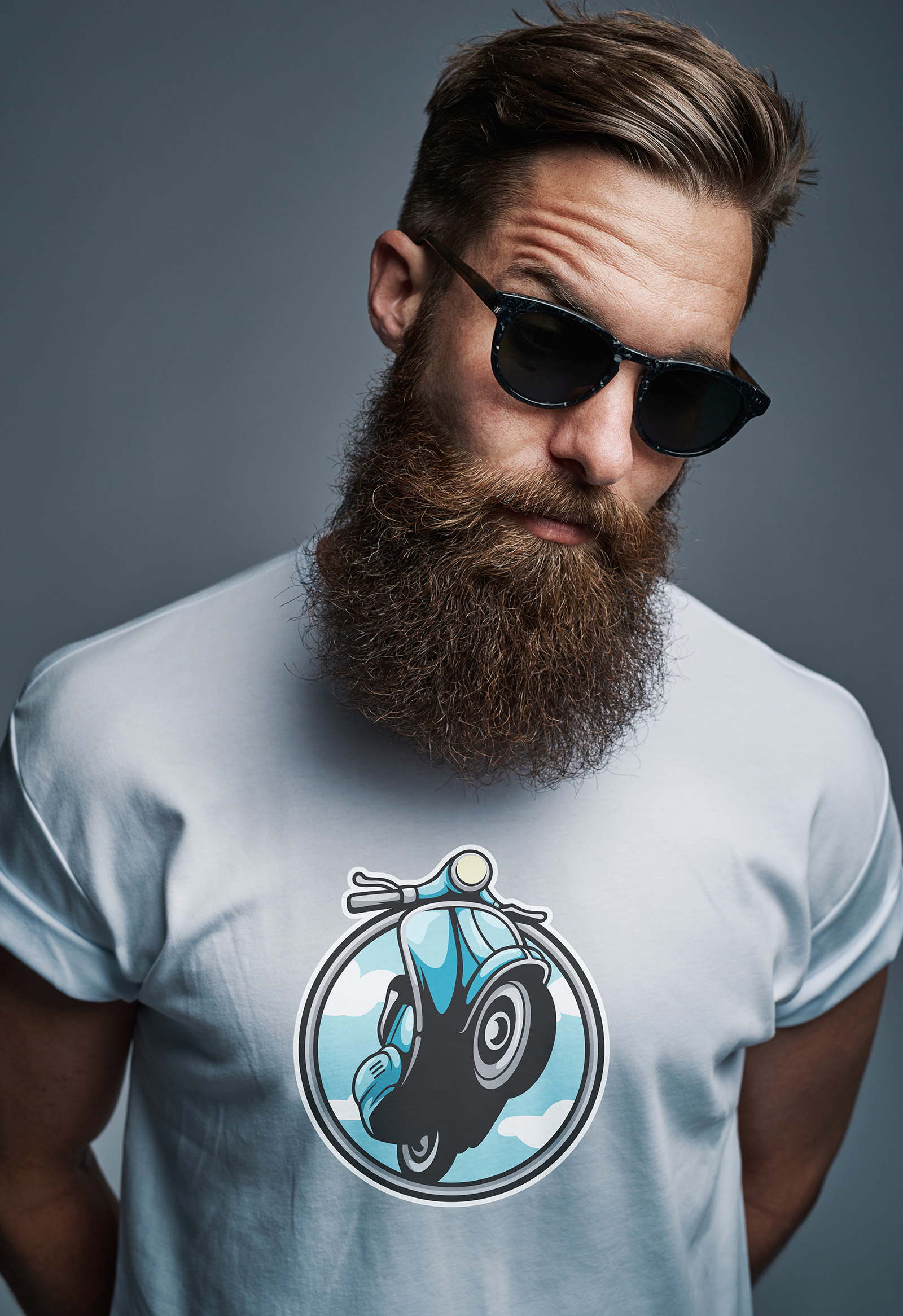Model wearing a white Chaktee51 t-shirt with a vintage scooter graphic